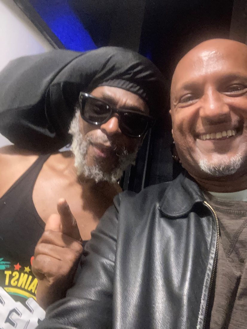 Paolos TK smiling in a selfie with David Hinds of Steel Pulse